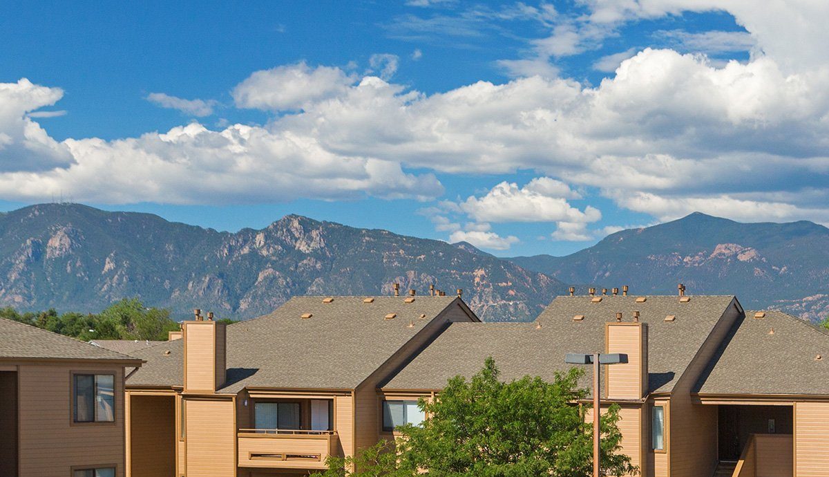 Western Terrace buildings with Pikes Peak behind them